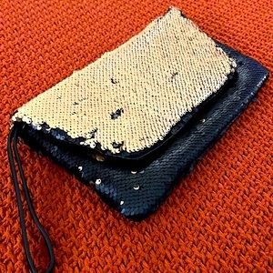 NEVER USED Black and Gold Color Shifting Clutch